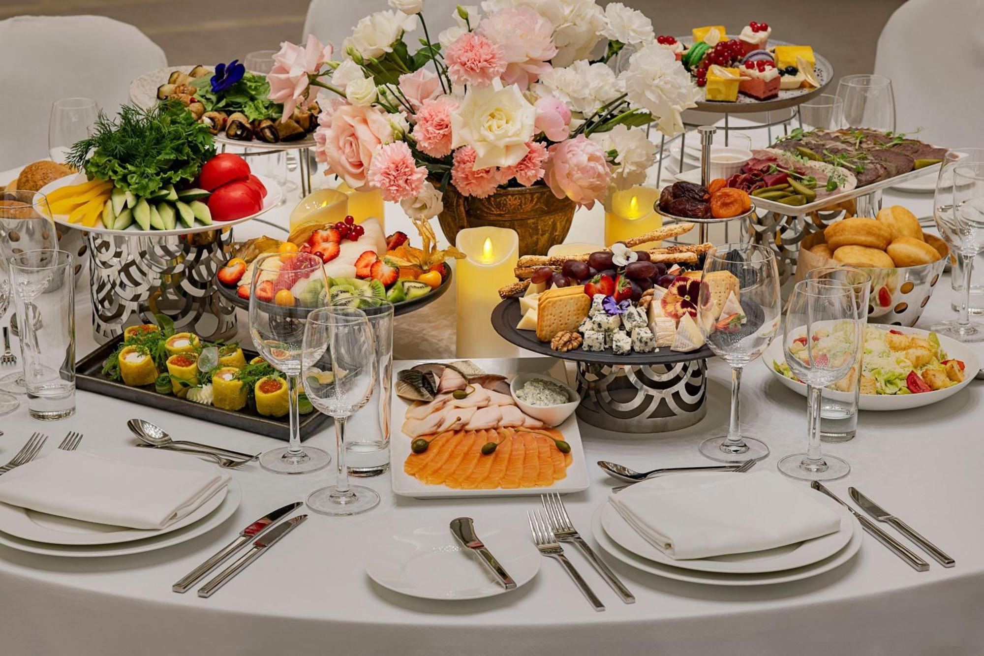 Sheraton Astana Hotel Exterior photo A table set for a wedding reception