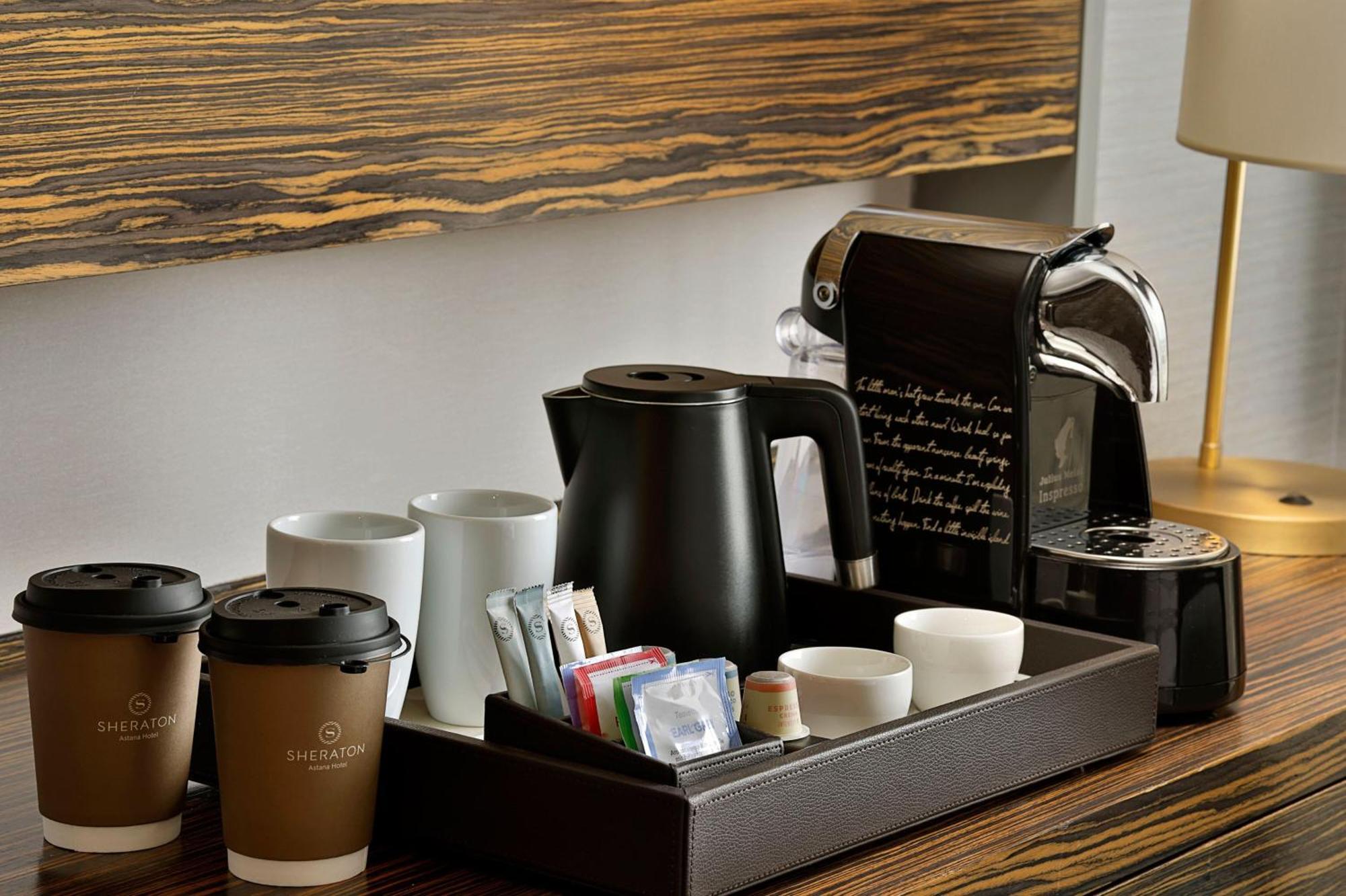 Sheraton Astana Hotel Exterior photo A Nespresso coffee machine in a hotel room